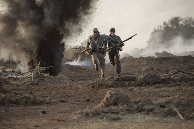 Matthew McConaughey and Jaco Lofland in a scene from Free State of Jones