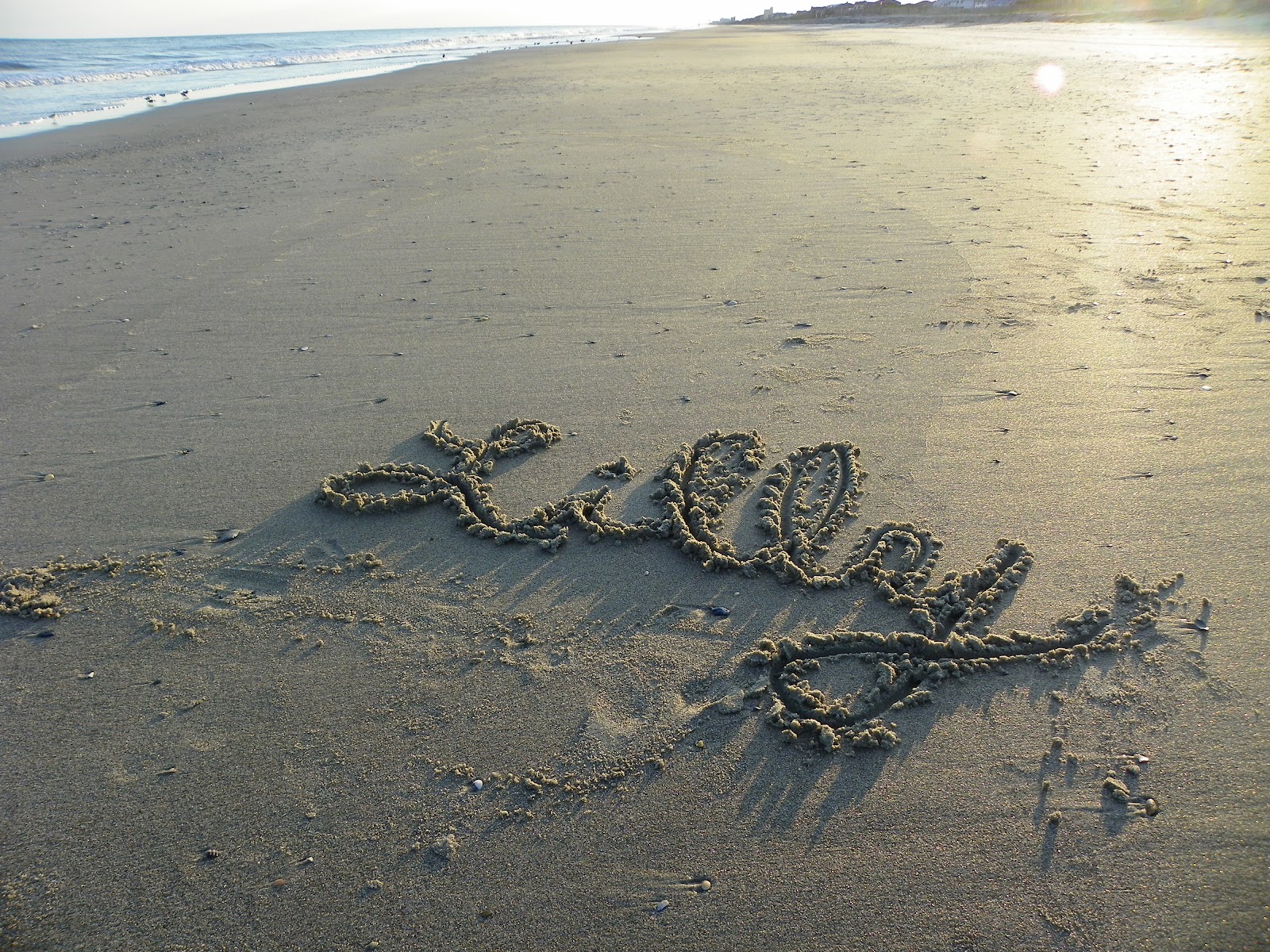 Pray For Lilly Name in the sand