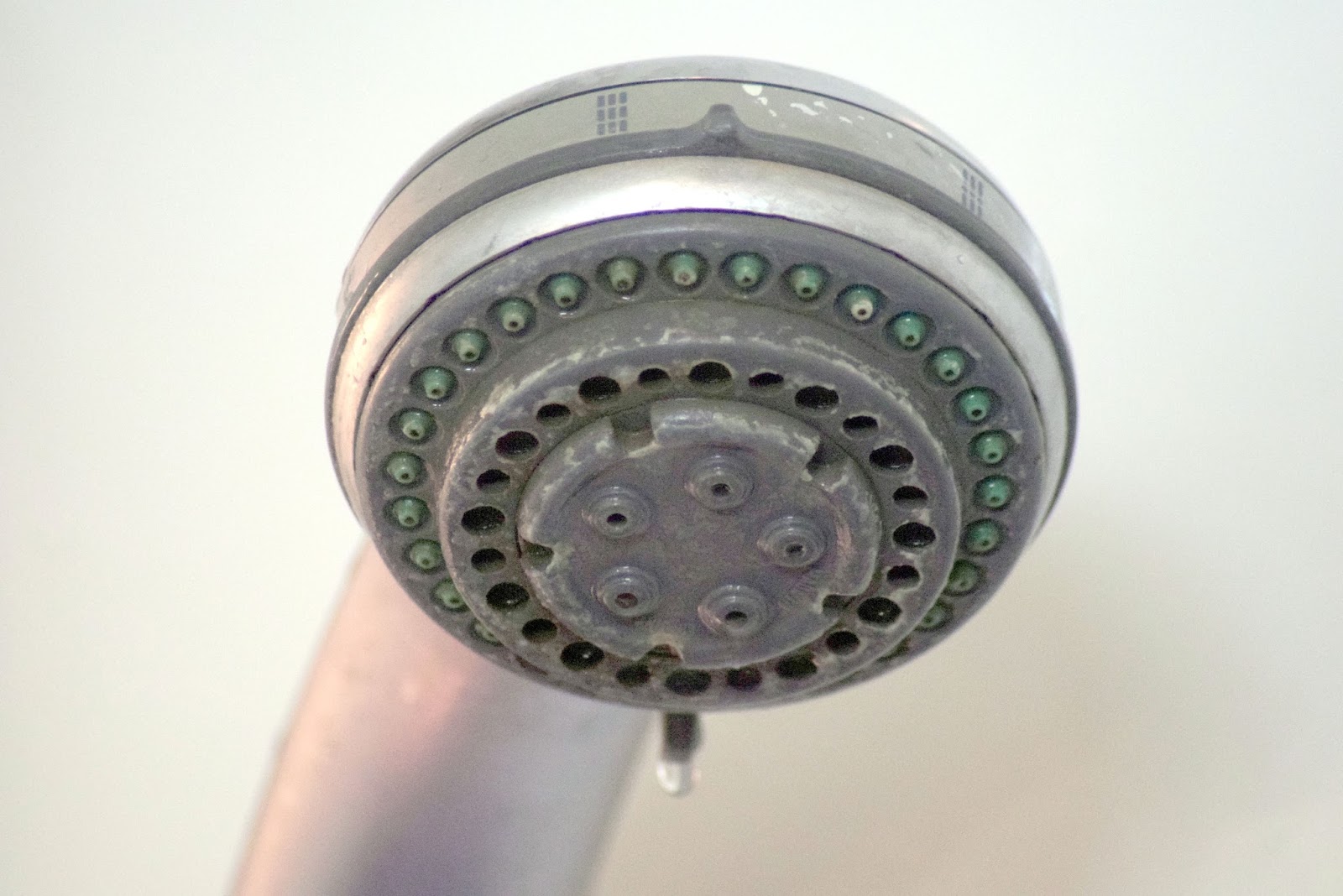 DIY remove hard water stain on shower head & unclogging shower head Its all about enhancing