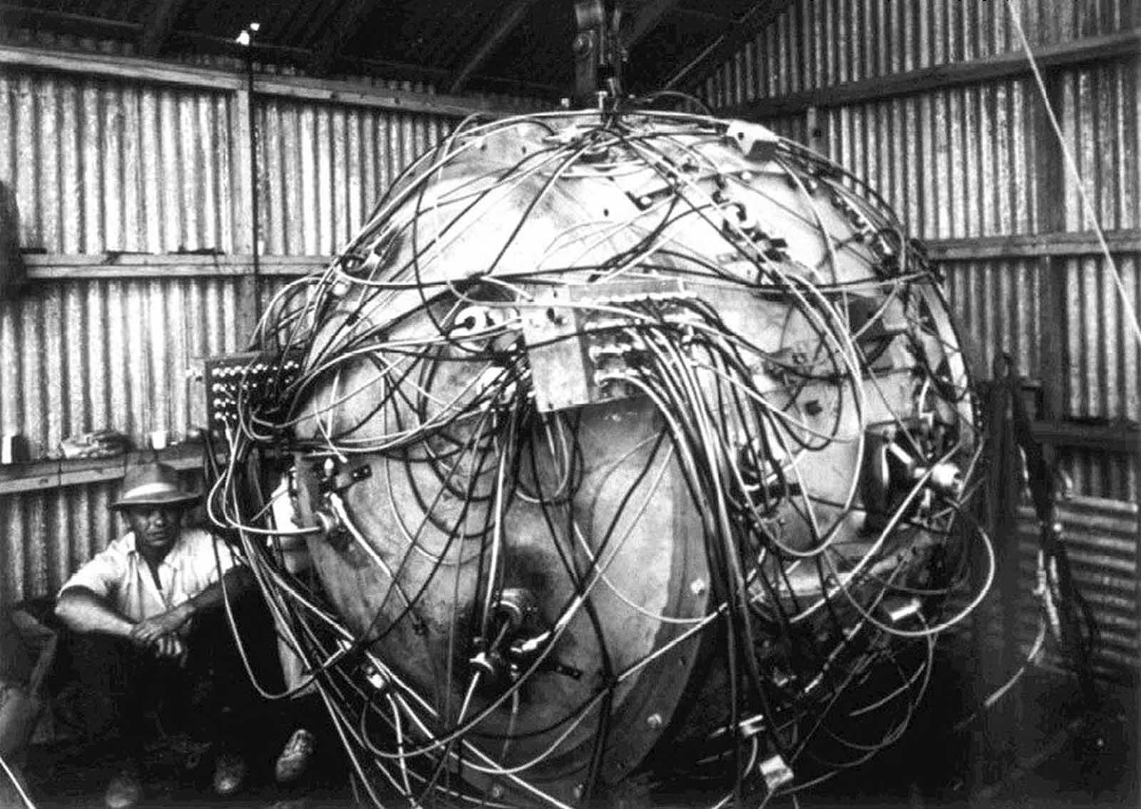 Exposed wiring of “The Gadget,” the nuclear device that exploded as part of Trinity, the first test of an atomic bomb. At the time of this photo, the device was being prepared for its detonation, which took place on July 16, 1945.