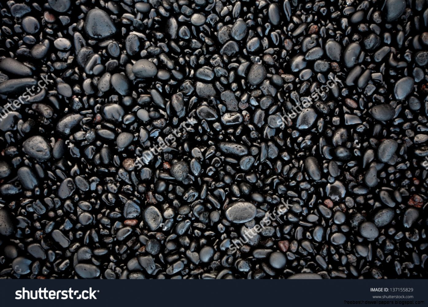 Black Stones On A Black Sand Beach As A Background Hawaii Maui