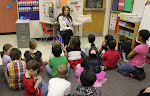 Reading to children at Inlet View Elementary