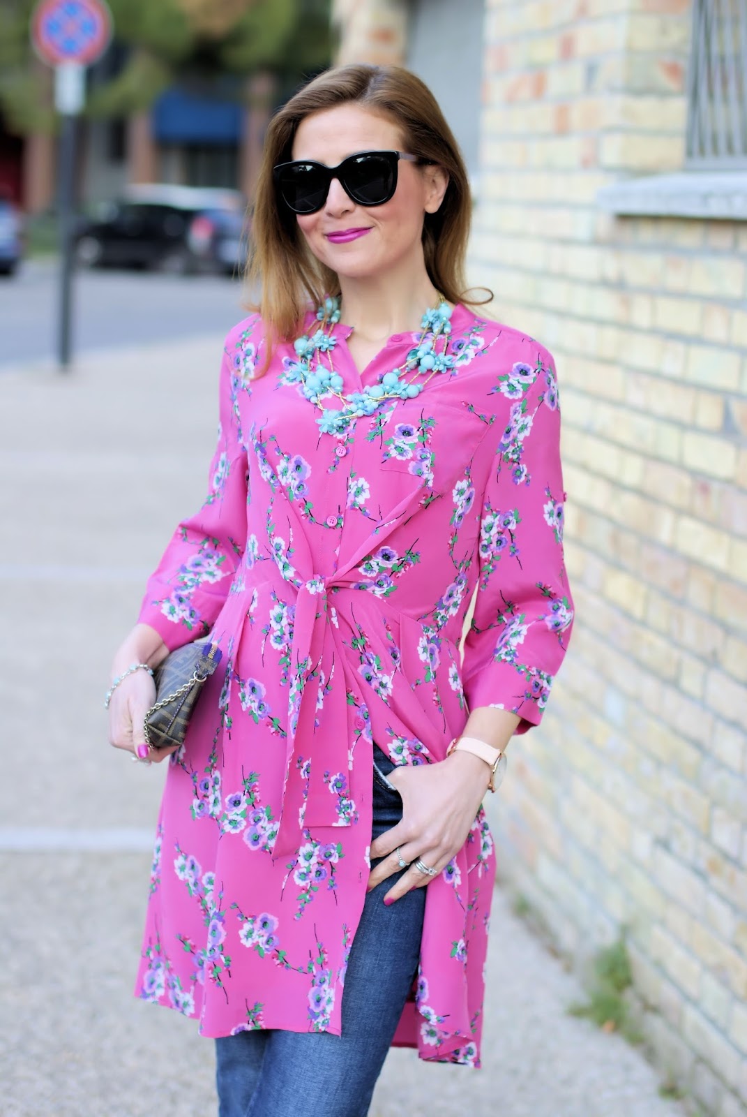 How to wear a dress over jeans: outfit idea with Metisu dress | Fashion ...