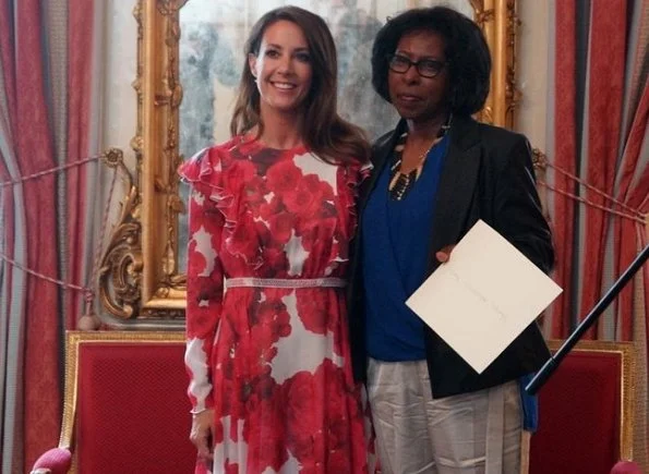 Princess Marie wore Giambattista Valli Rose-print ruffled silk-georgette Dress at the French embassy in Copenhagen for Scholastique Mukasonga