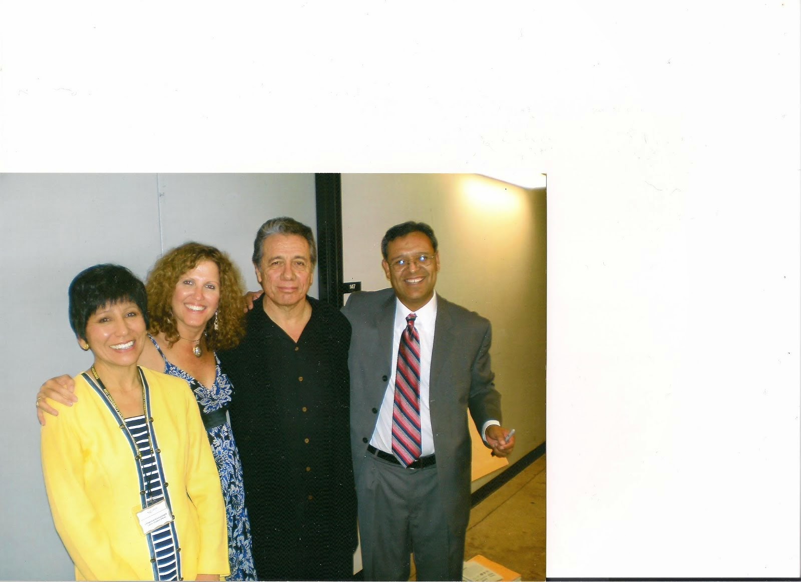 Mom (wearing yellow) and friends with Edward James Olmos