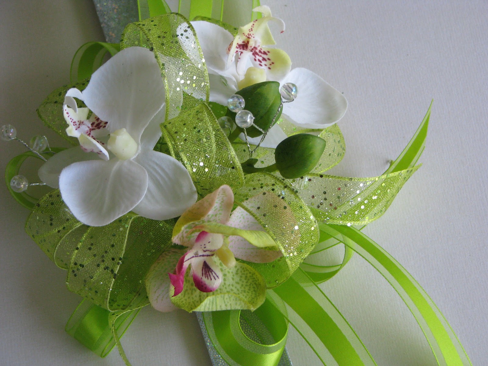 Violettas White and Green Orchid Silk Wrist Corsage