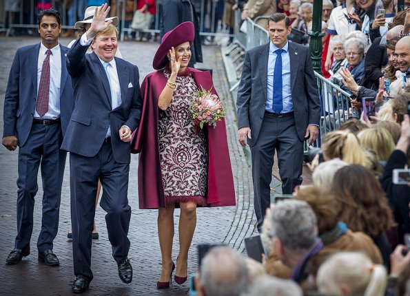 Dutch Queen Maxima wore a new Natan branded silk cape and Natan inlaid design dress.Natan suede Pumps