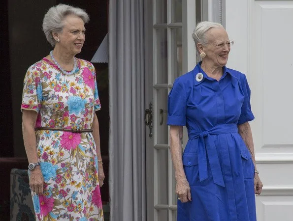 Queen Margrethe and Princess Benedikte attended ceremony of guard changing held at Grasten Palace. Princess Mary