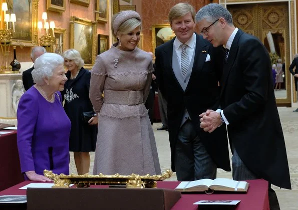 Queen Elizabeth II, Prince Charles and Camilla, Duchess of Cornwall. state banquet at Buckingham Palace. Maxima wore a new jacket by Claes Iversen