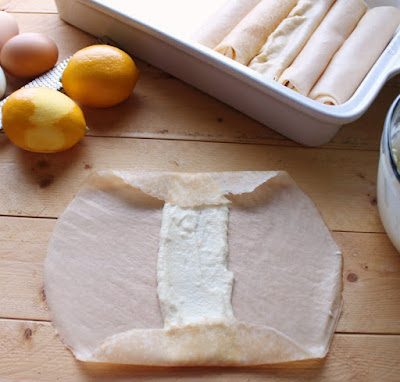 folding ends of crepe over filling, ready to roll