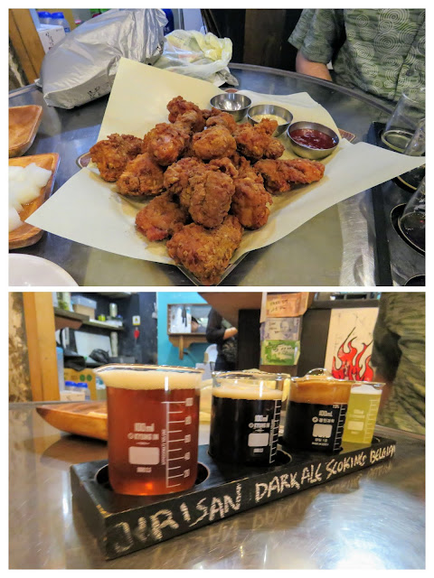 Fried chicken and craft beer in beakers at CornerBe in Seoul South Korea