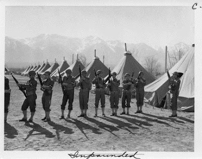Clem Albers, Military police officers checking their weapons at Manzanar Relocation Center, c. 1942 Courtesy National Archives and Records Administration
