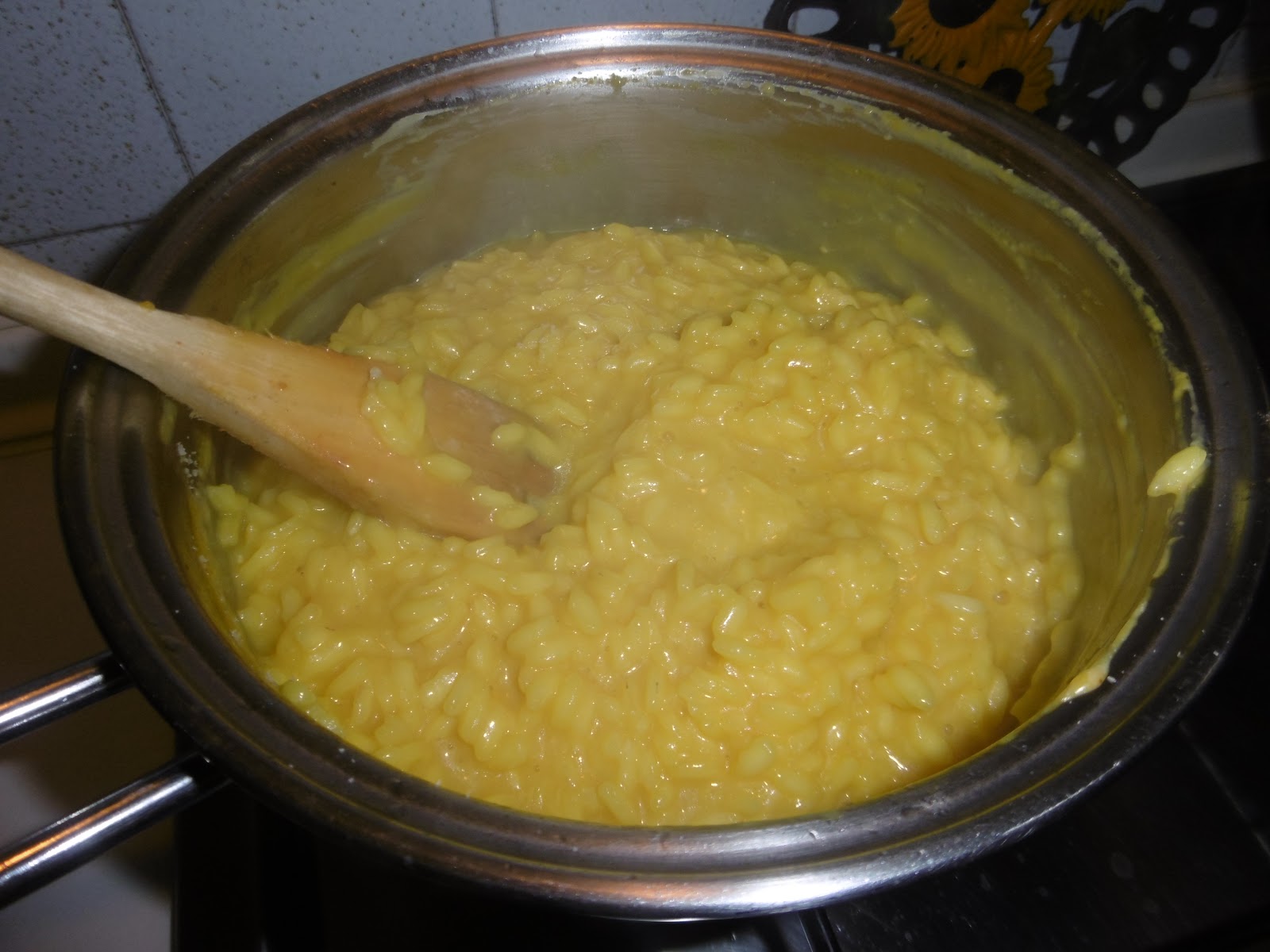 Ossibuchi con piselli e riso allo zafferano