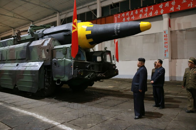 North Korean leader Kim Jong Un inspects the long-range strategic ballistic rocket Hwasong-12 (Mars-12) in this undated photo released by North Korea's Korean Central News Agency (KCNA) on May 15, 2017. KCNA via REUTERS
