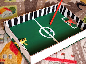 how to make a cardboard and pom pom soccer game