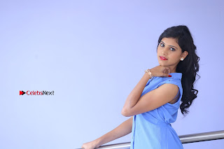 Telugu Actress Mounika UHD Stills in Blue Short Dress at Tik Tak Telugu Movie Audio Launch  0026