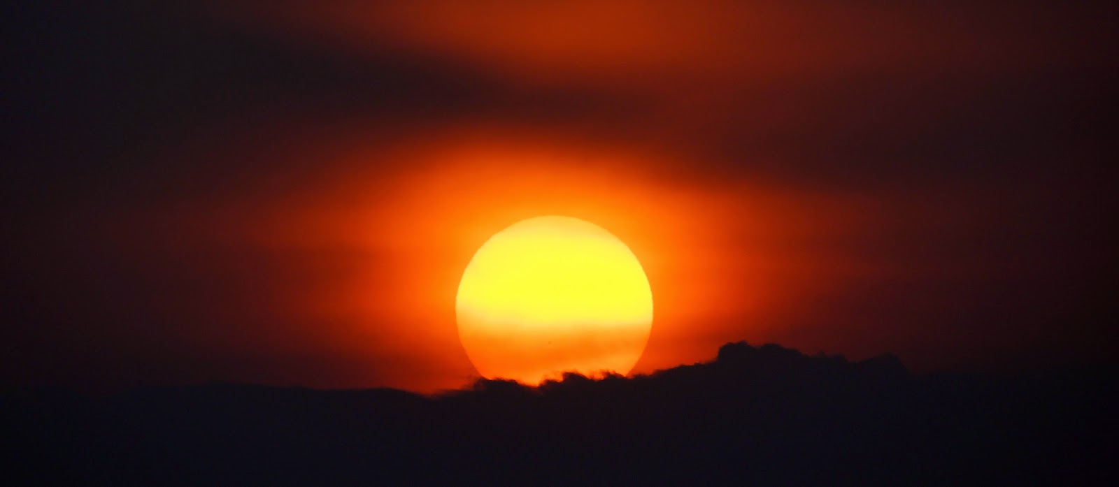 Henk Kruit, Fotografie: De zon komt op boven de Noordduinen...