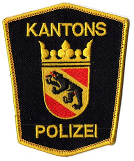origine image : https://commons.wikimedia.org/wiki/Category:Police_patches_of_Switzerland