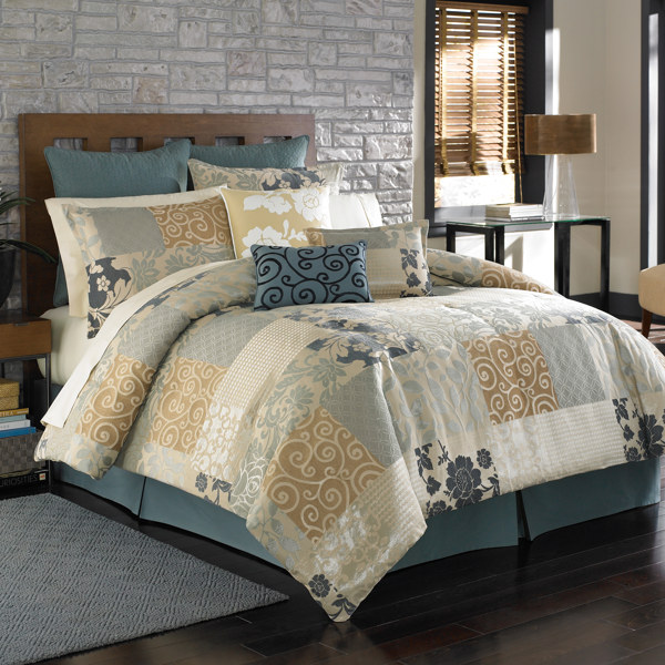 This uniquely detailed comforter set with a woven jacquard patchwork design...