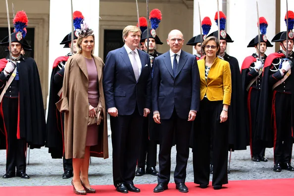 Italian Prime Minister Enrico Letta  and his wife at the palazzo Chigi in Rome