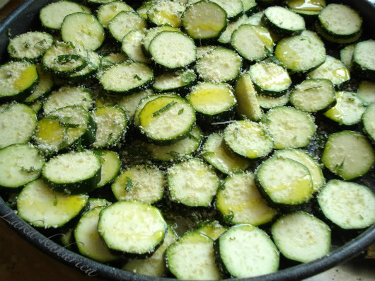 zucchini sprinkled with grated Parmesan