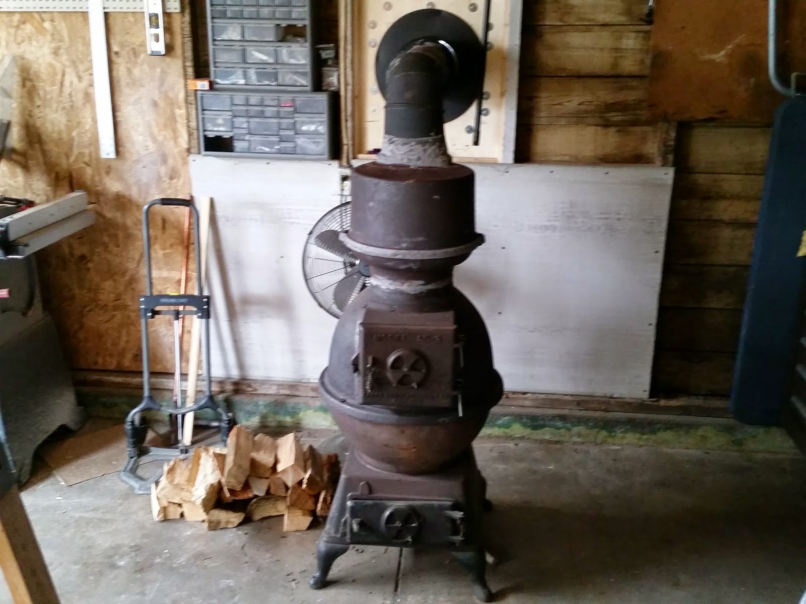 The Sustainable Couple: Installing Our Antique Cast Iron Wood Stove.