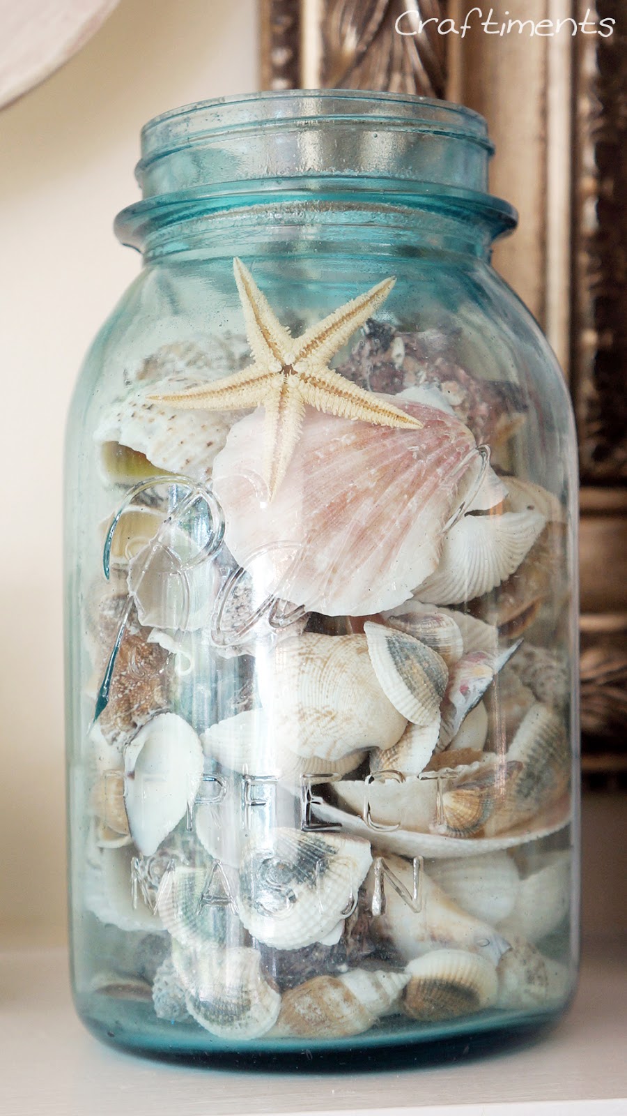 vintage mason jar filled with seashells