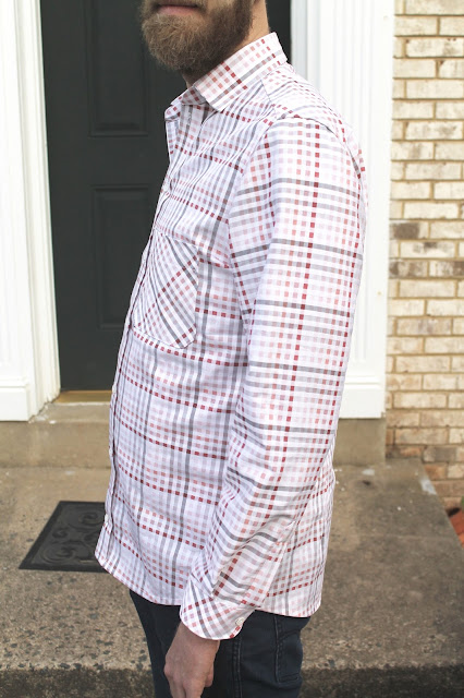 A pink and white plaid men's shirt made using the Thread Theory Fairfield Button-Up Shirt sewing pattern.