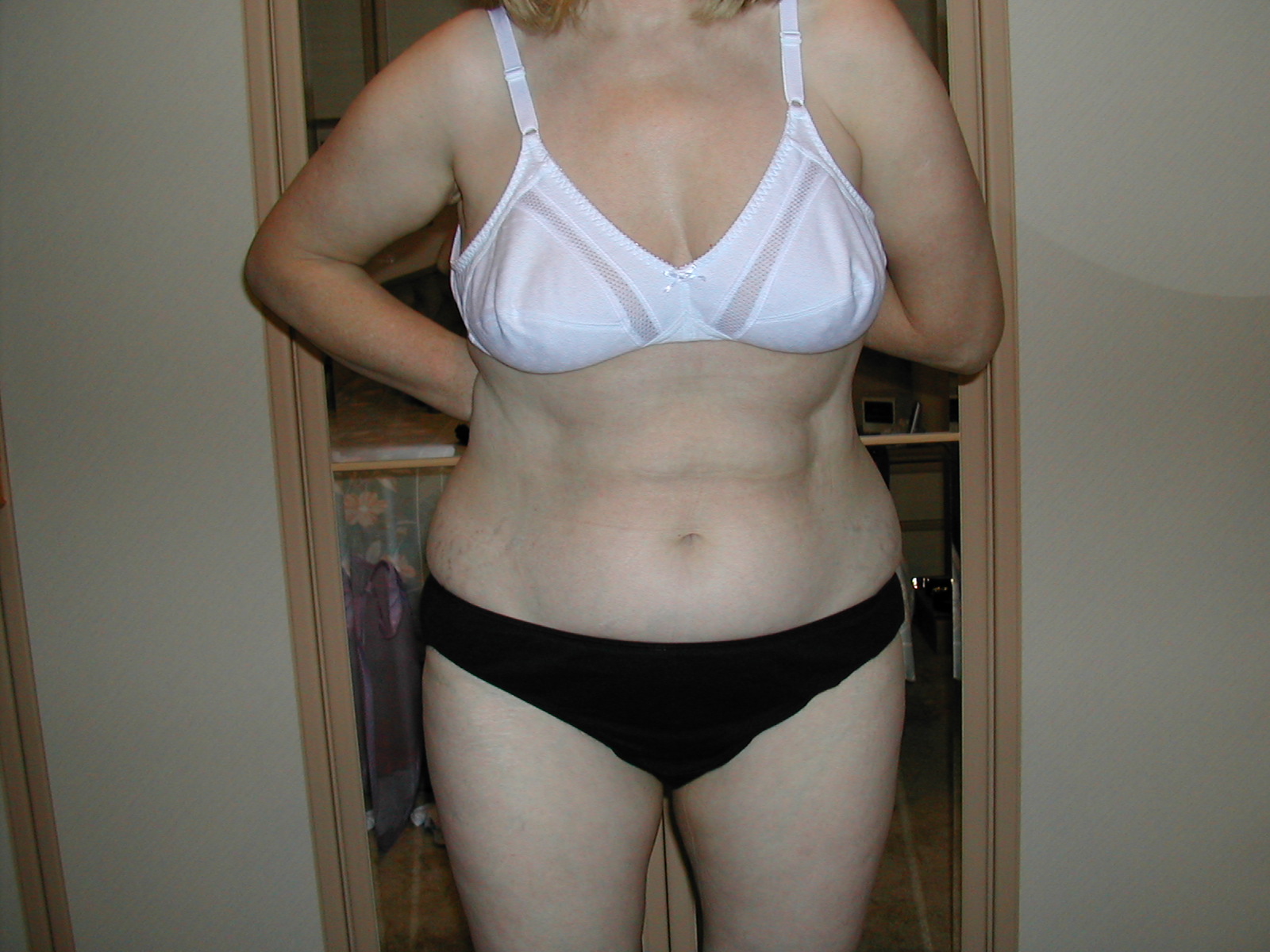 Wife in black knickers and white bra.