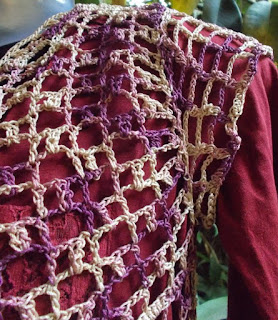 Sweet Nothings Crochet free crochet pattern blog ; photo of the sleeve on the Easy One Piece Shelled Bolero (front view on mannequin)
