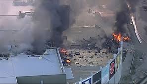 Melbourne Plane Crash, Melbourne, Australia - Five Dead as Aircraft hits the Shopping Centre