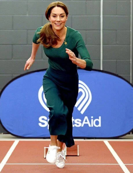 Kate Middleton wore a new high waist wide-leg trousers by Zara. Kate Middleton wore adidas Originals Stan Smith sneaker