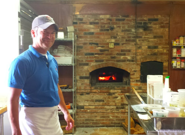 Every Sunday, Elkin Creek Vineyard lights the brick oven for gourmet pizzas.