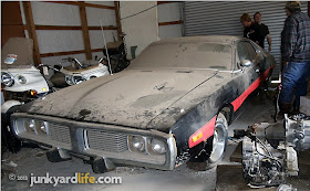 Front view of black 1973 Dodge Charger 440 Rallye package showing grille and bumperettes on junkyardlife.com