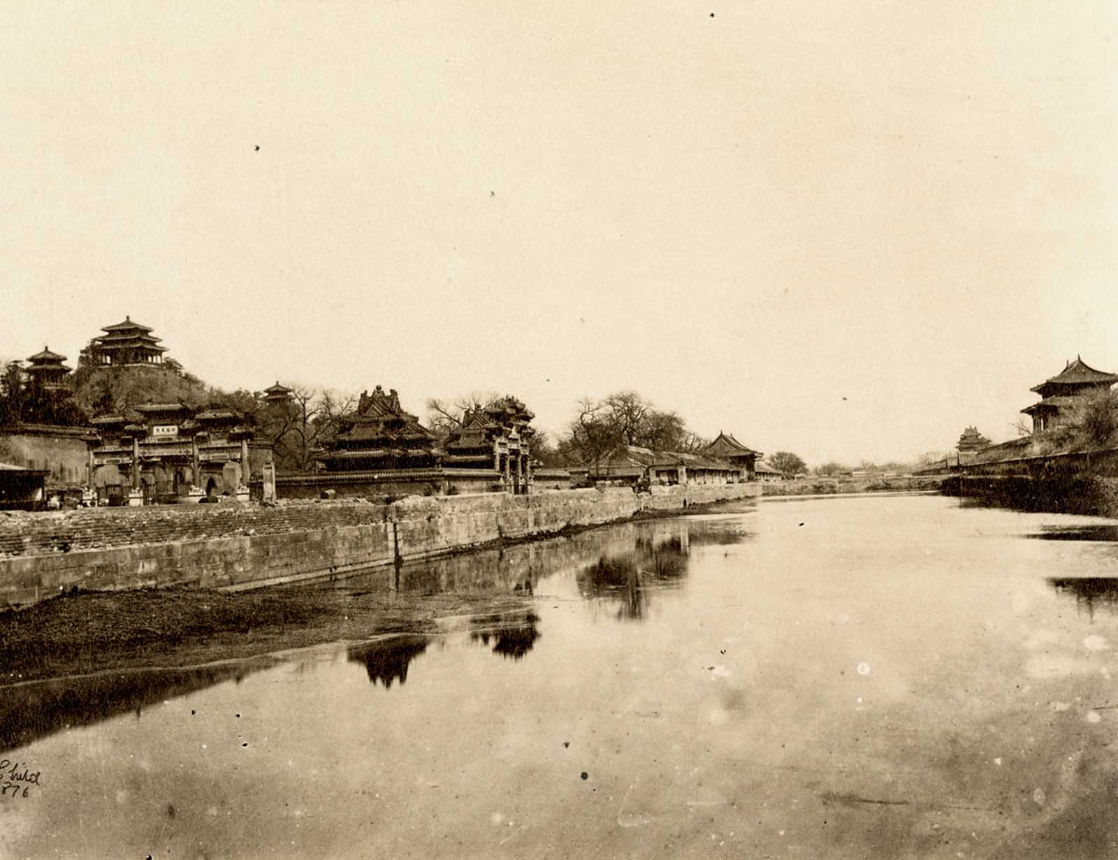 A view of the Forbidden City from across an imperial moat. This photograph shows 15th and 16th-century Chinese fortification systems which do not exist today.
