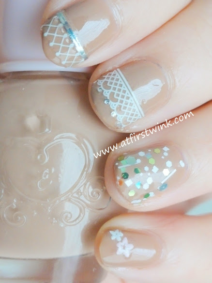 Etude House beige nail polish with lace nail stickers and Innisfree glitter nail polish on the ring finger