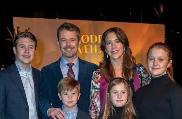 Prince Christian, Princess Isabella, Prince Vincent and Princess Josephine. Crown Princess Mary wore a reversible robe coat by Etro