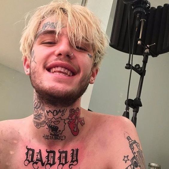 Daddy tattoo on chest of lil peep