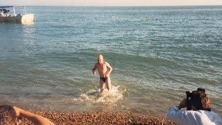 The moment 11-year-old Tom Gregory emerged from the English Channel at Dover after his record feat
