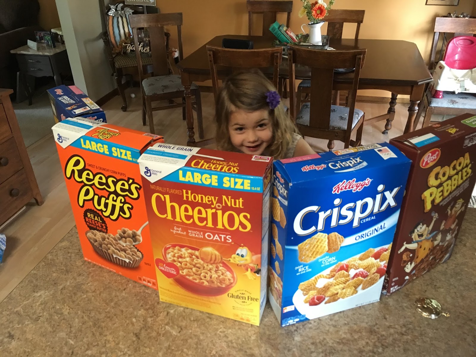 Who will make me laugh There is someone behind all these cereal boxes...