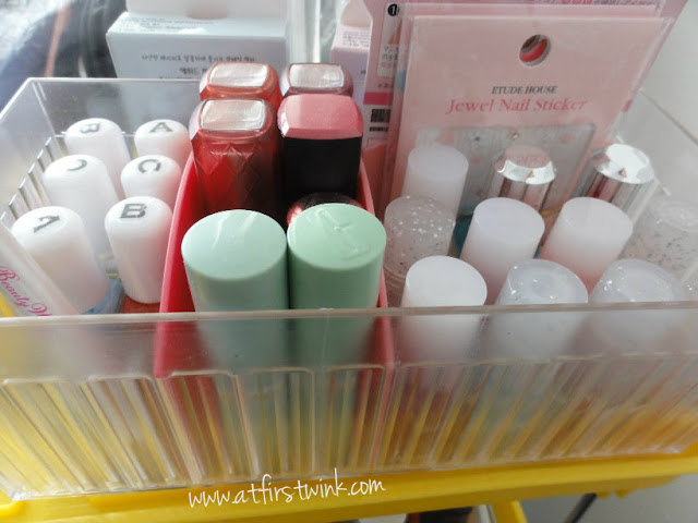 top layer of the nail polish and cosmetics tower