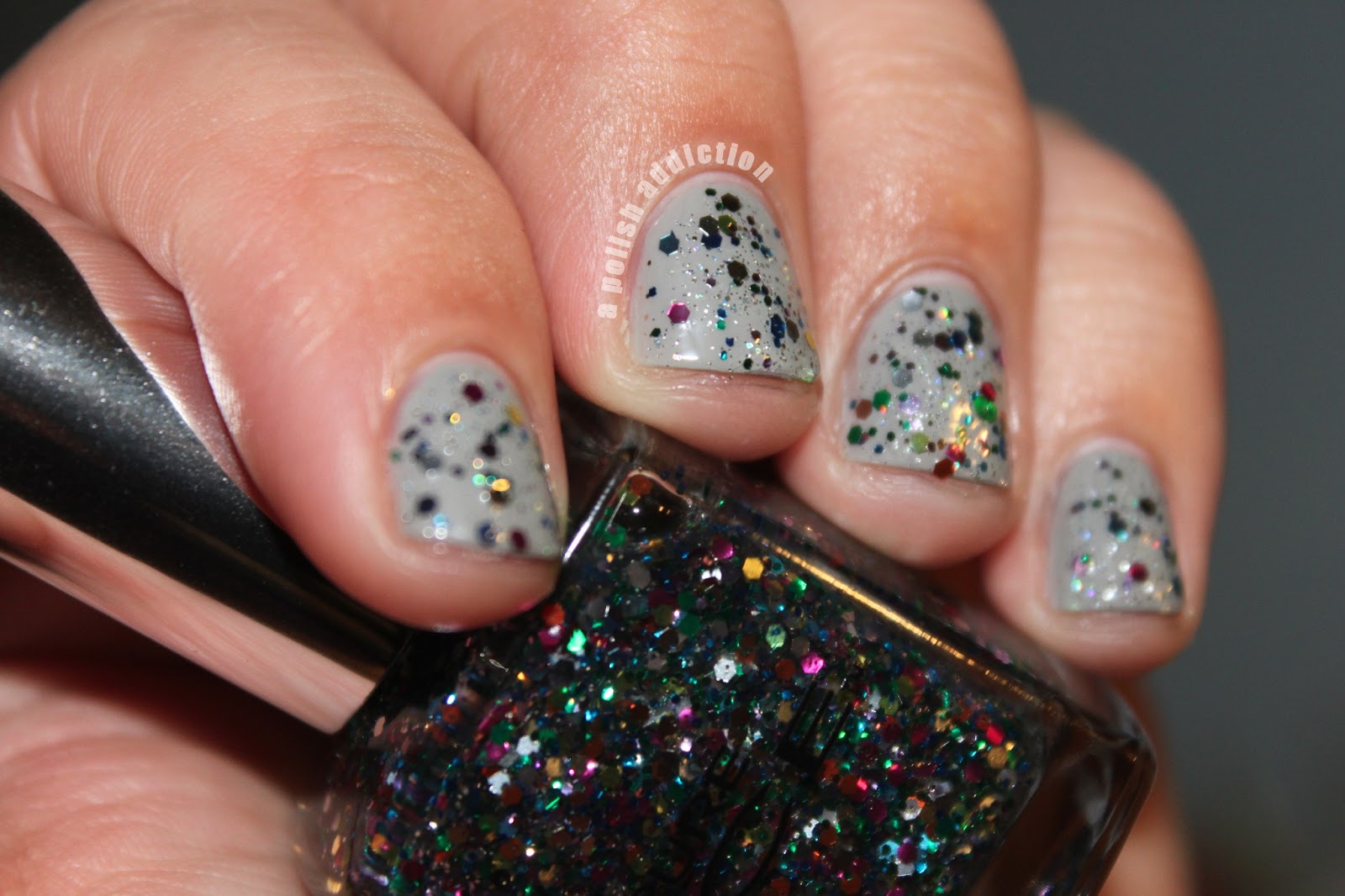 A Polish Addiction Glitter, glitter everywhere! Confetti Nails