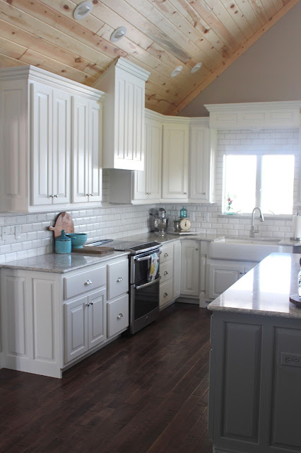 Kithcen remodel with custom cabinets, beveled subway tile and Cambria Berwyn quartz