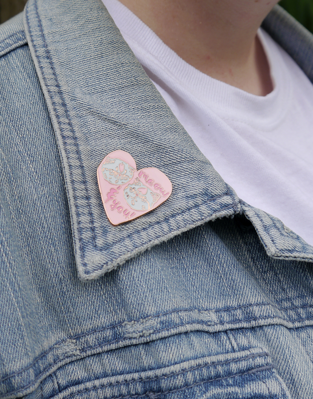 Hello Harriet for Lucky Dip Club enamal pin badge Meow & you pink cat enamal pin badge by Hello Harriet and Lucky Dip Club worn on a denim jacket