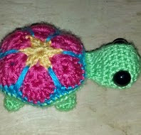 http://www.ravelry.com/patterns/library/small-flower-turtle