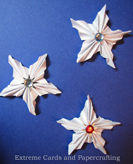 small pleated stars with jewel centers