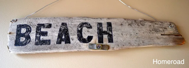 Driftwood with BEACH painted on it