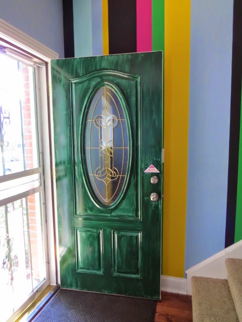 first coat of green Rustoleum paint on the door
