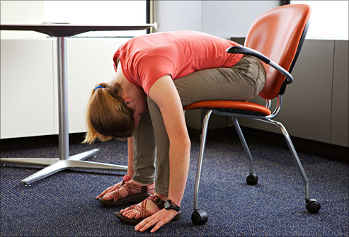 5. Side stretch: hold onto the chair with one hand and lift the other arm u...