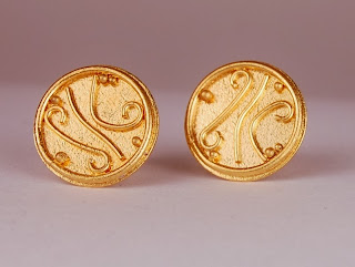 round disc earrings in 22k gold with granular surface texture